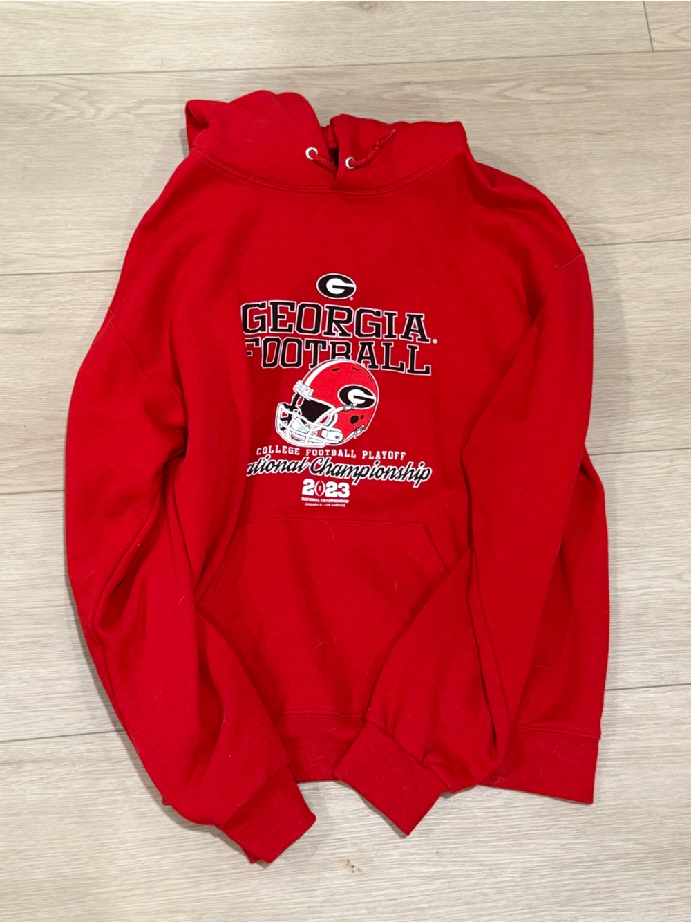 GEORGIA football, 2023 national championships champions. Red hoodie